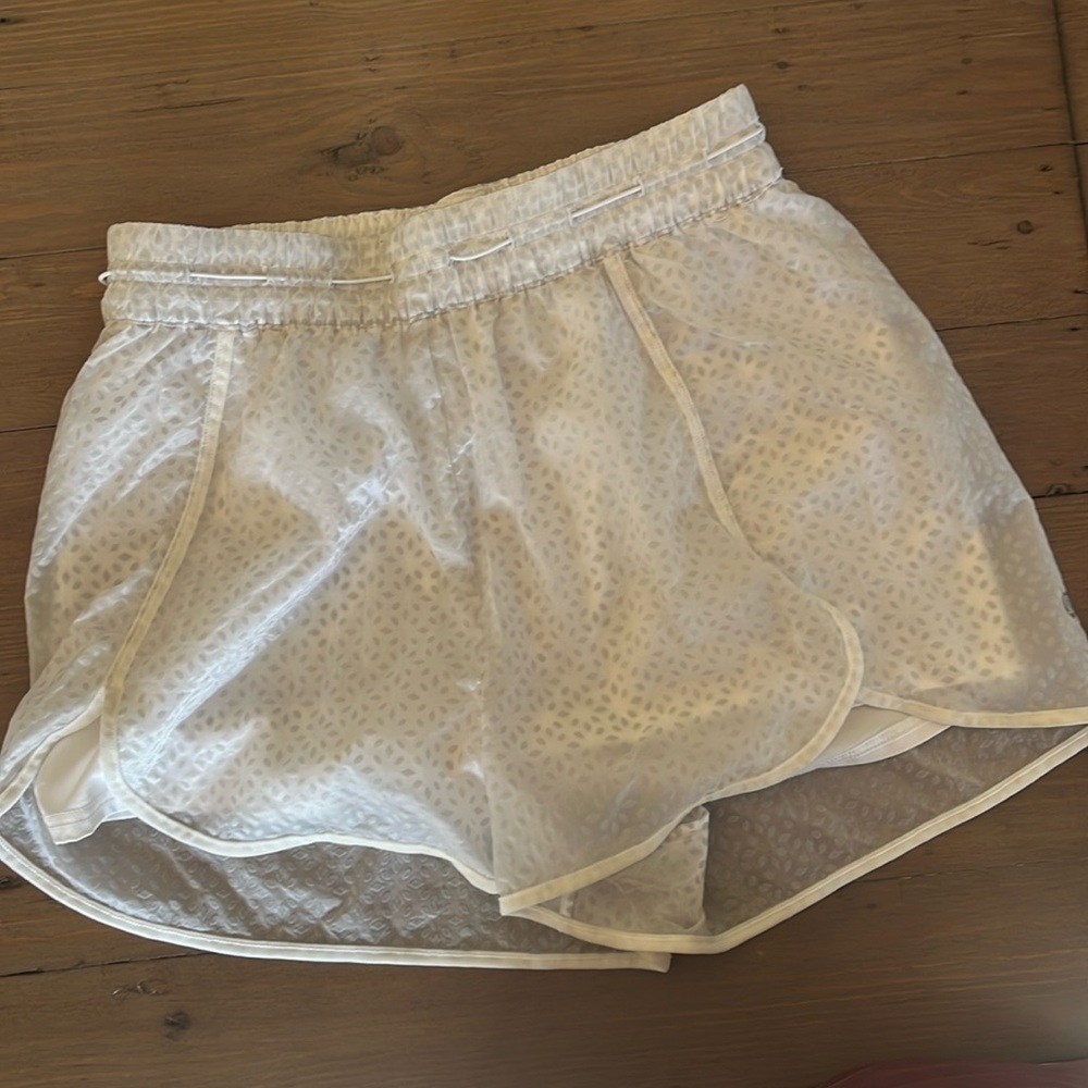 Lululemon size 4, Find Your Flock, lined white shorts.
